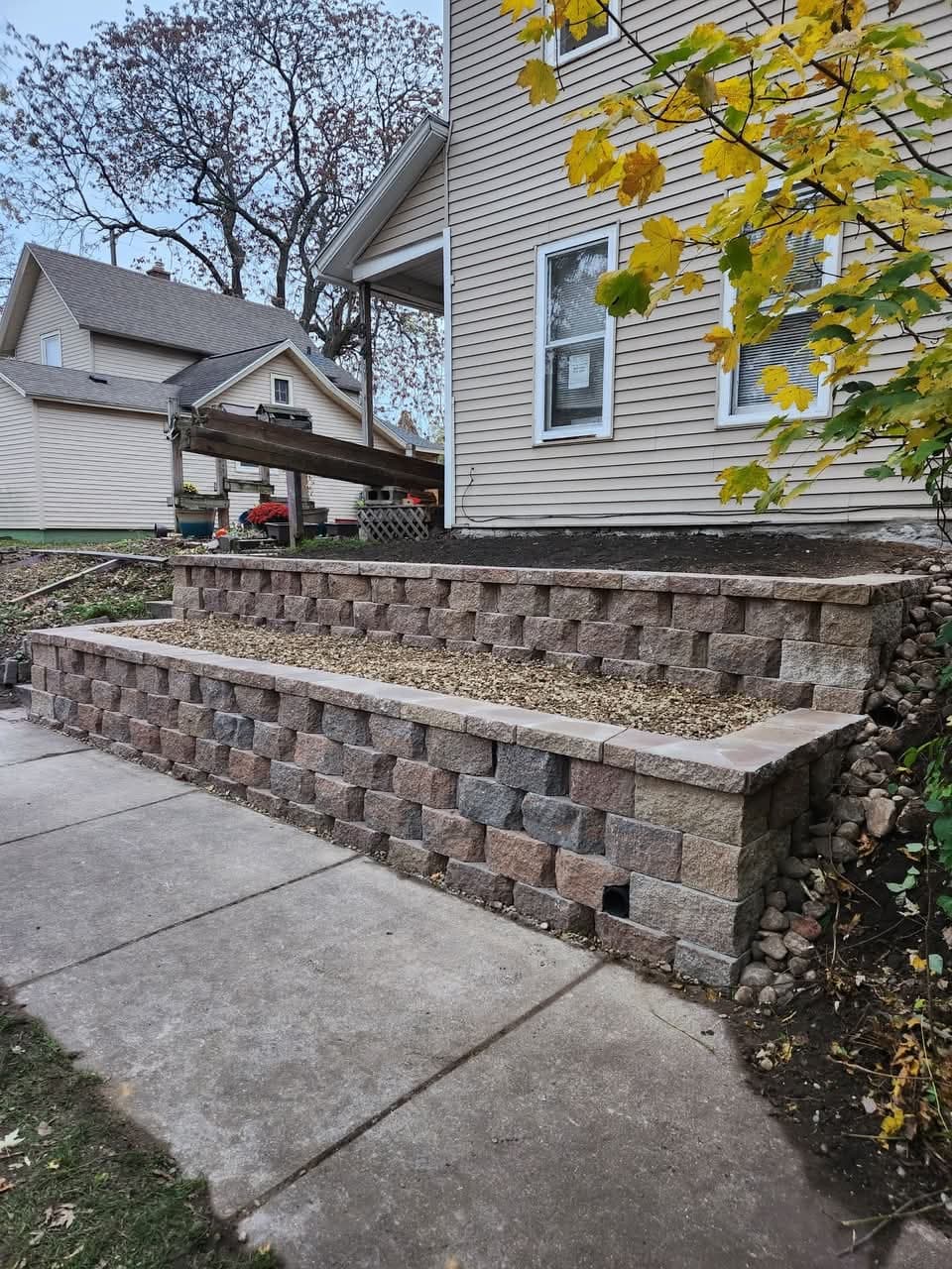 Landscape design and bed work in West Michigan